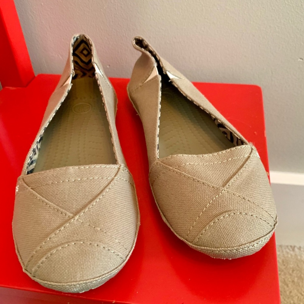 NWOT CROCS BEIGE SLIP-ONS